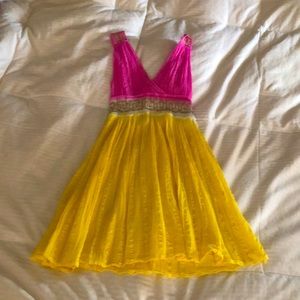 A summer yellow White, and pink dress from Greece.